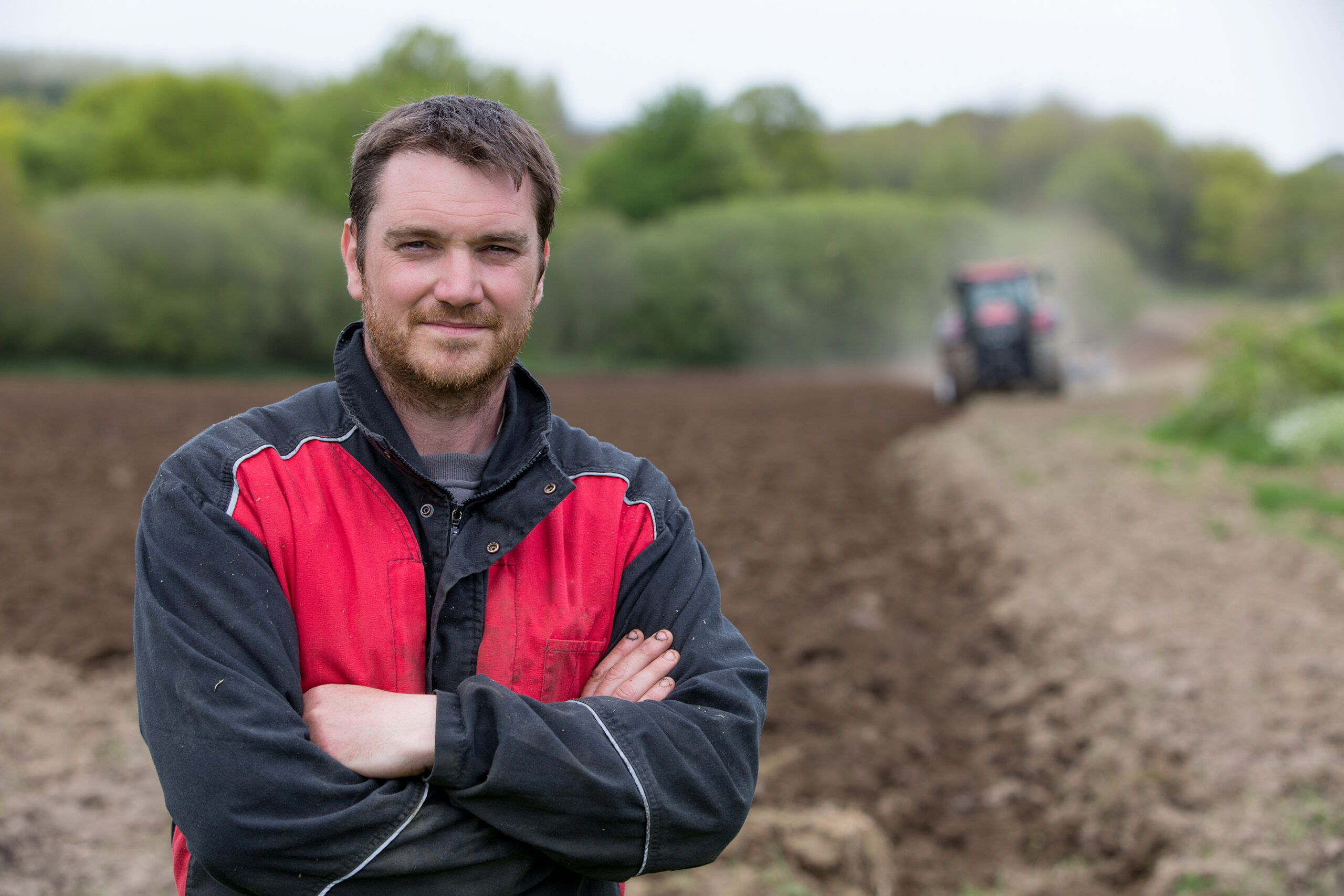 farmer showing new tractor farmer showing new tractor